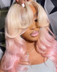 Woman wearing blonde and pink wig