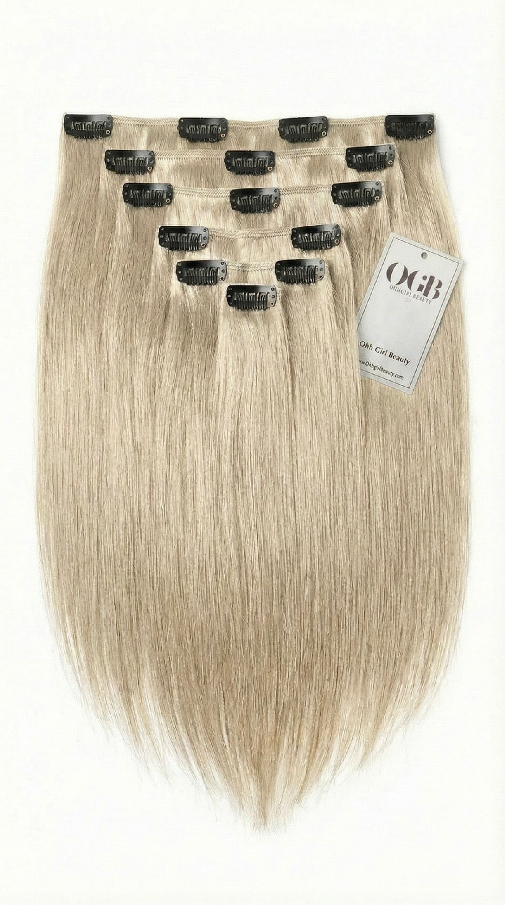 Set of blonde hair extensions with clips on a white background, featuring the OGB label.