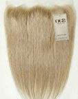 Ohh Girl Beauty (OGB) human hair clip-in extension in a rich blonde color
